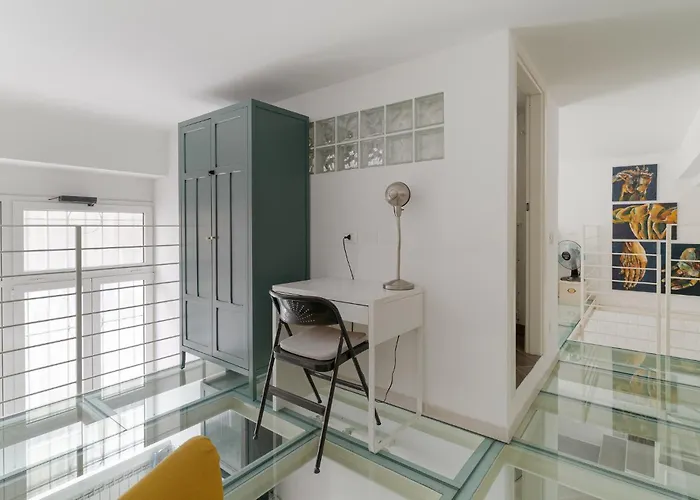 Guesthost - Comfortable Loft Citta Studi Apartment
